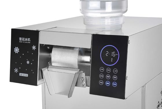 Machine de rasage automatique de glace à flocons de neige de 1300W avec fonction de vitesse variable